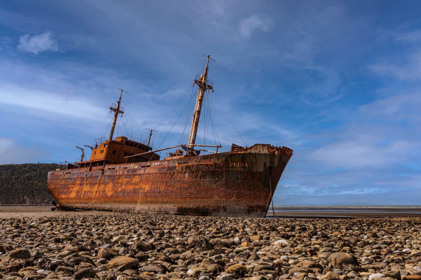 The Desdémona stranded on the pebble beach of Cabo San Pablo, Tierra del Fuego