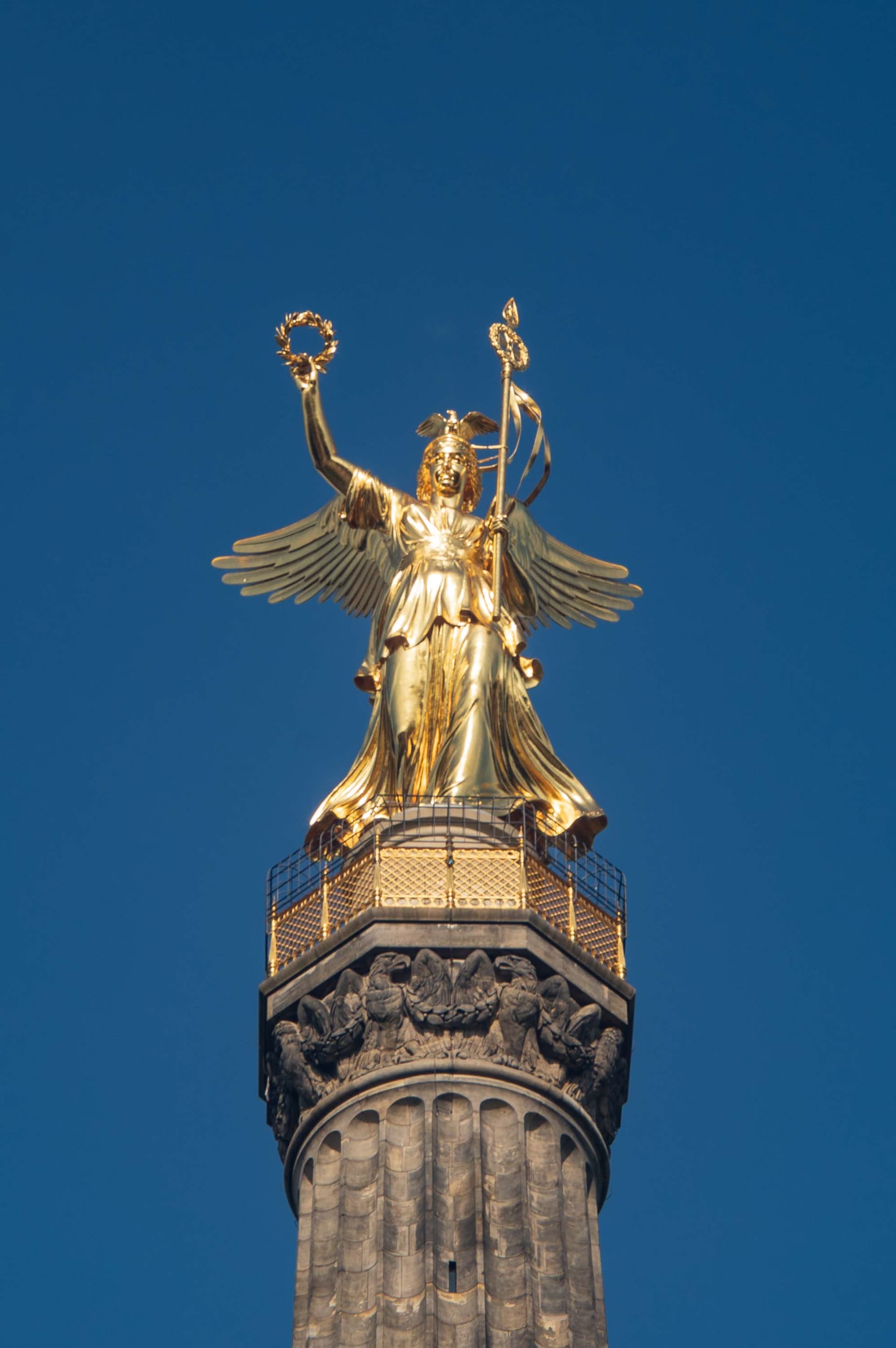 The Victory Column and its golden angel, tiny but unmistakable from the Brandenburg Gate.