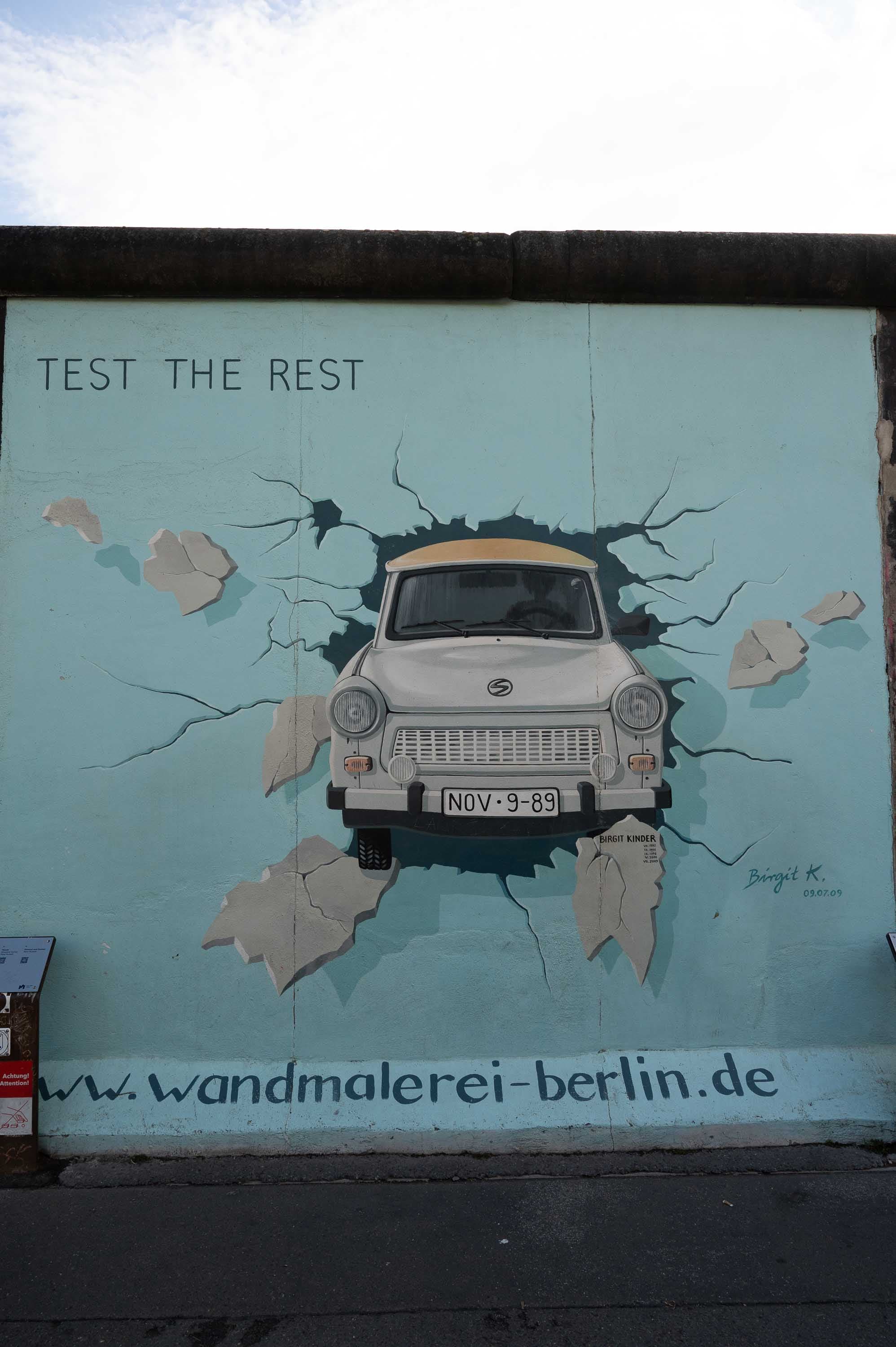 Birgit Kinder's mural at the East Side Gallery: a Trabant bursting through the Wall, with the license plate "NOV-9-89."