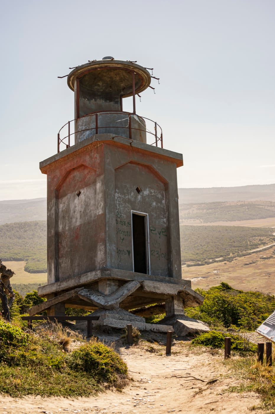 The 1945 concrete tower of the Cabo San Pablo lighthouse, resting on its broken foundations