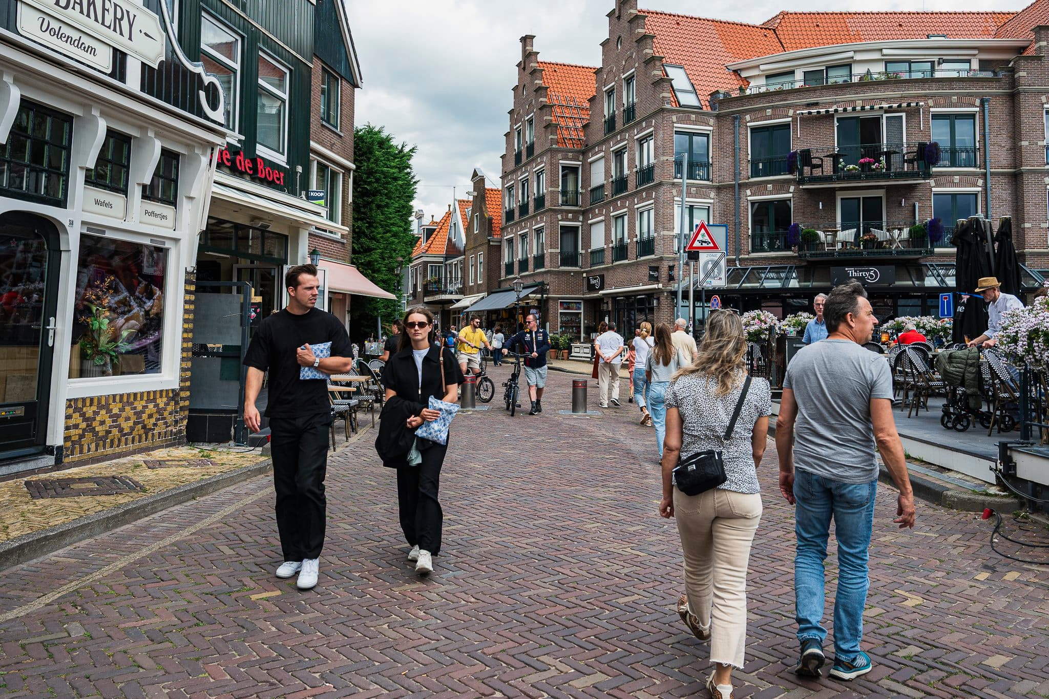 Volendam shopping street with brick houses