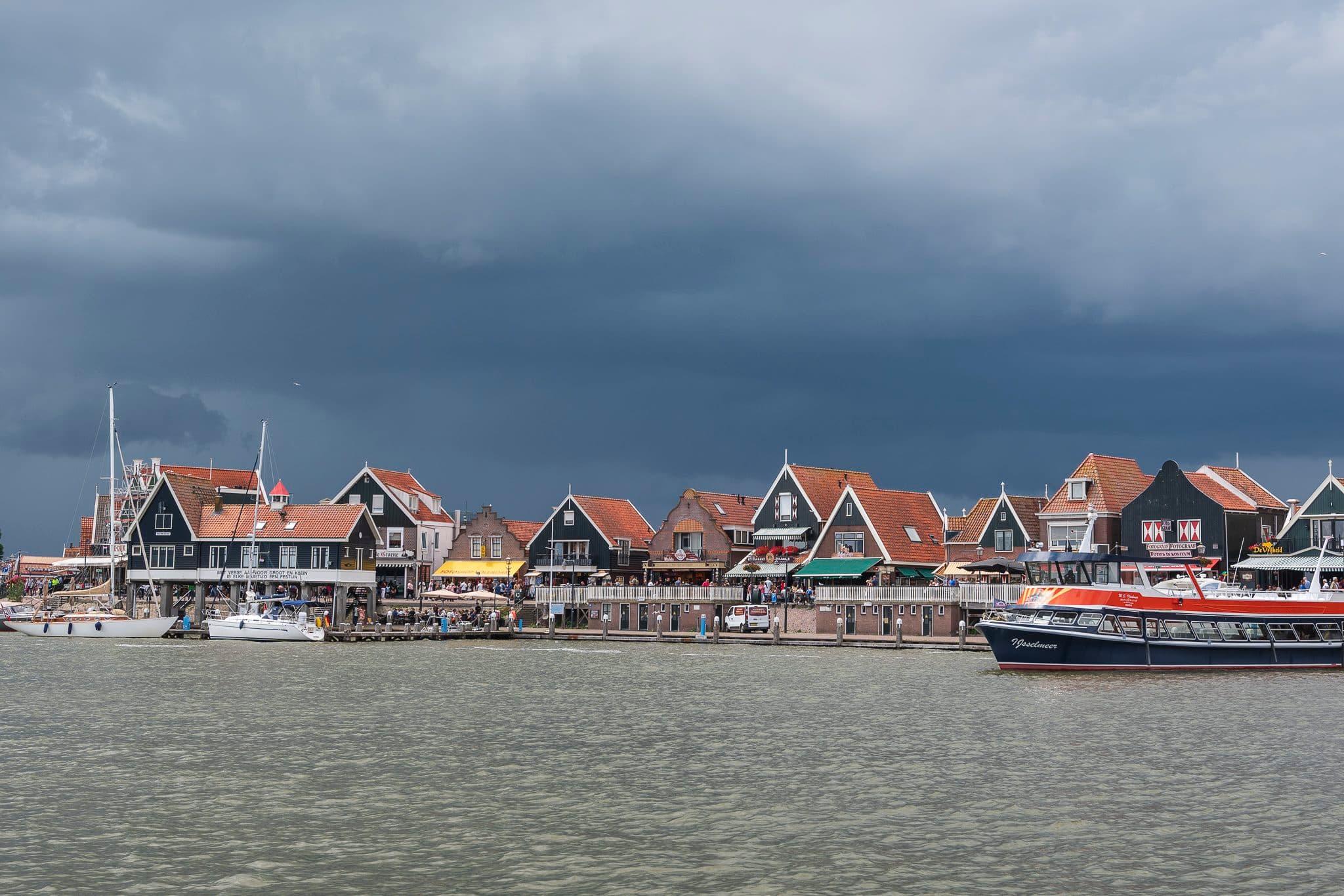 Volendam fishing harbor with moored boats