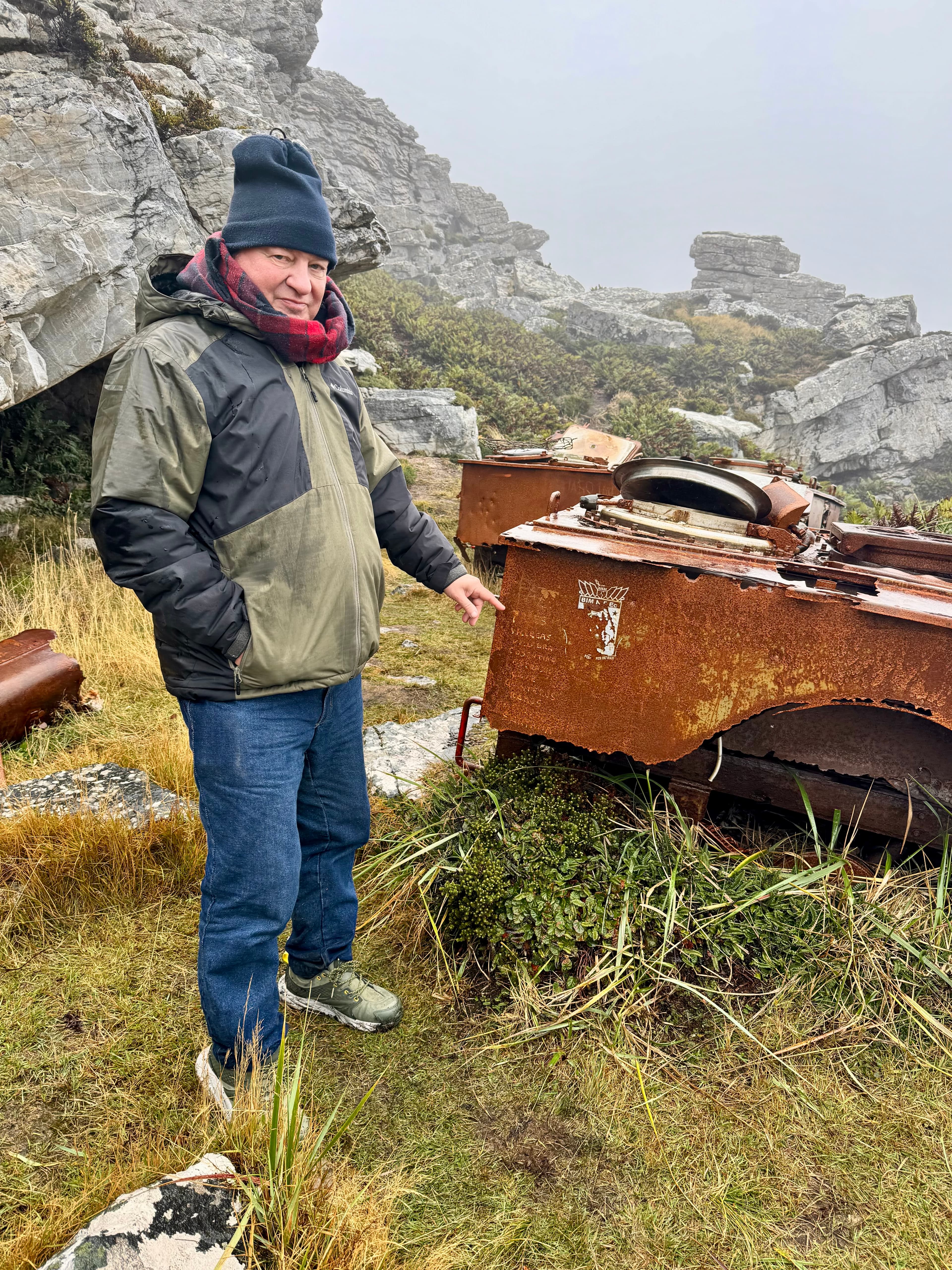 The rusted remains of a field kitchen on Mount Tumbledown, with Rodrigo's name carved alongside those of his comrades.